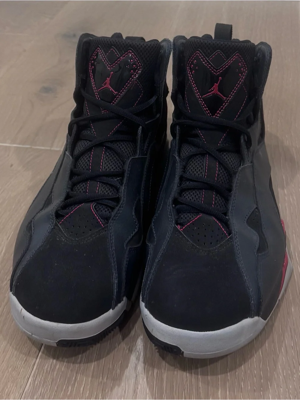 Jordan Black Sneakers with Red Stitching